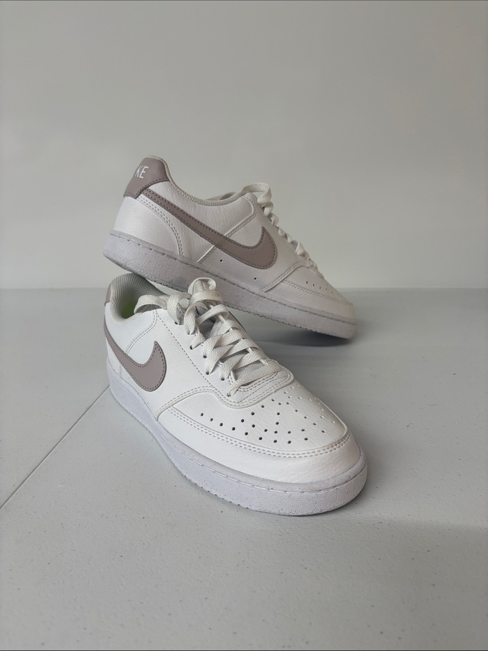 Nike White Low-Top Sneakers with Taupe Swoosh